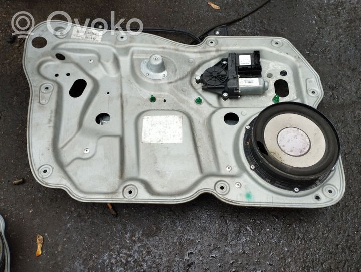 Volkswagen Touran I Alzacristalli della portiera anteriore con motorino 1T2837729AE