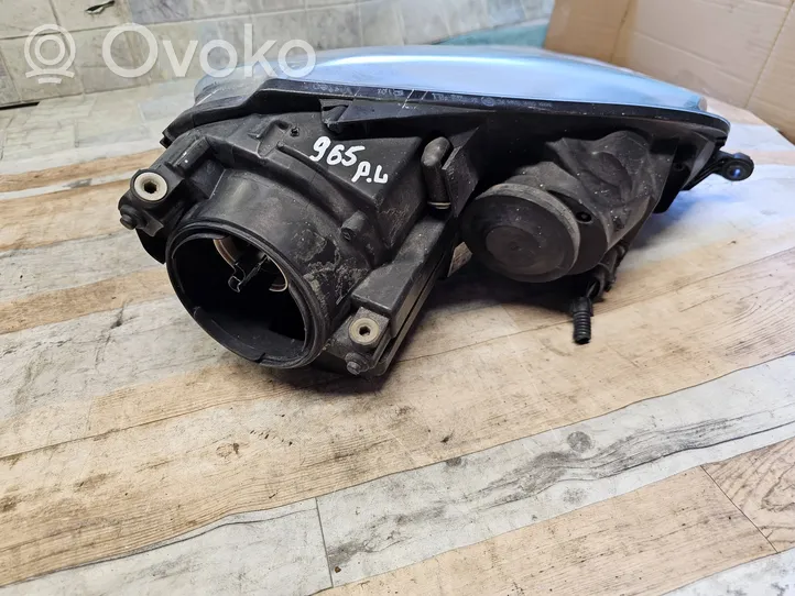 Volkswagen Golf V Lampa przednia 1K6941005D