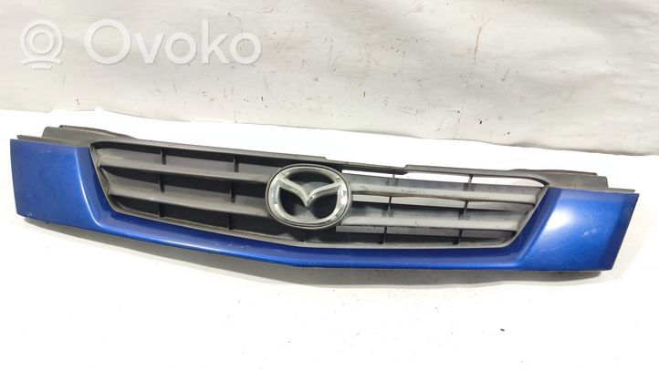 Mazda Demio Grille calandre supérieure de pare-chocs avant DC3550712