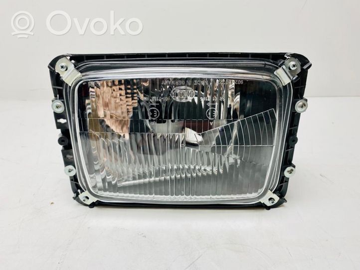 Mercedes-Benz 207 310 Lampa przednia A0008209561