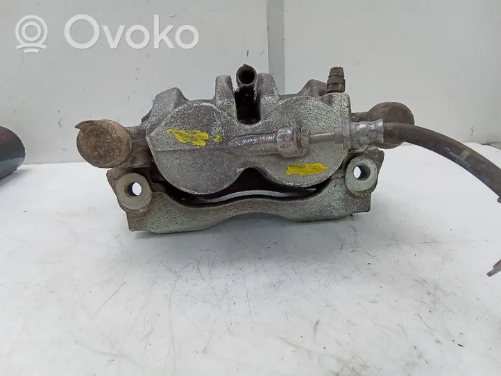 Nissan Cab Star Caliper de freno delantero 22970200