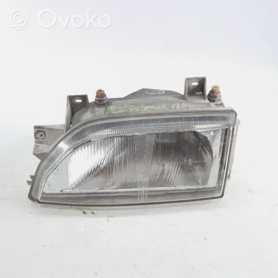 Ford Orion Phare frontale 654464514