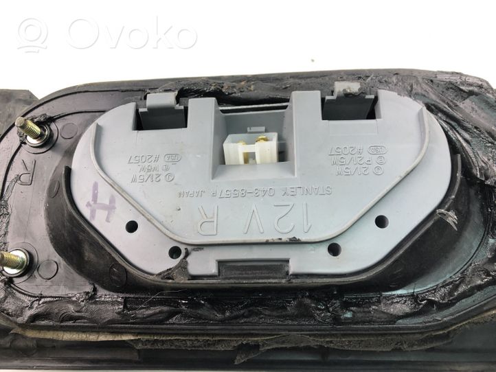 Mitsubishi Colt Luci posteriori 0438557R