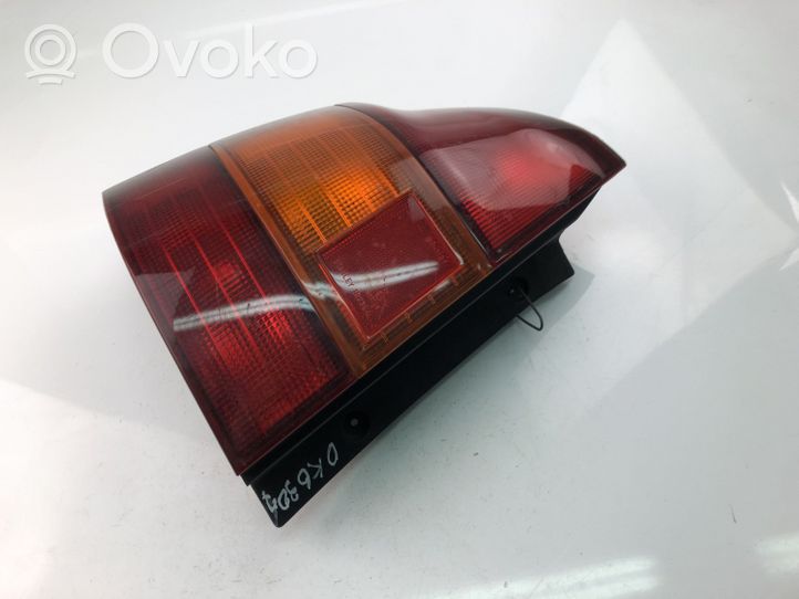 Mazda 323 Aizmugurējais lukturis virsbūvē 0432254