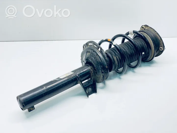 Seat Leon (5F) Front shock absorber with coil spring 5Q0413023FM