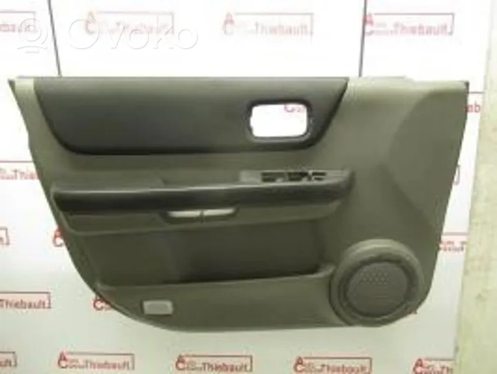 Nissan X-Trail T30 Garniture de panneau carte de porte avant 801538H330