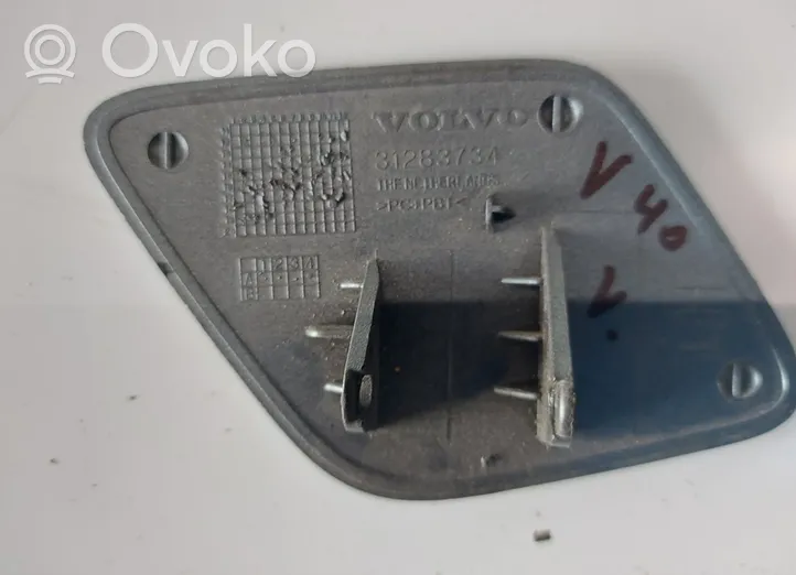 Volvo V40 Zaślepka spryskiwacza lampy przedniej 31283734