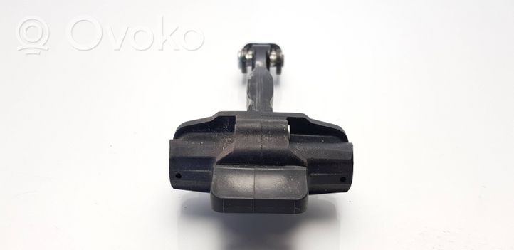 Ford Focus Rear door check strap stopper A27200AA