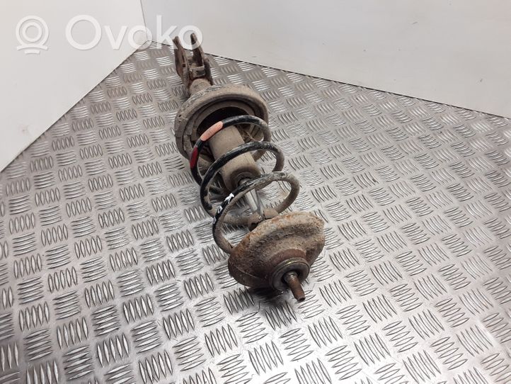 Renault Kangoo I Front shock absorber with coil spring 7700802667