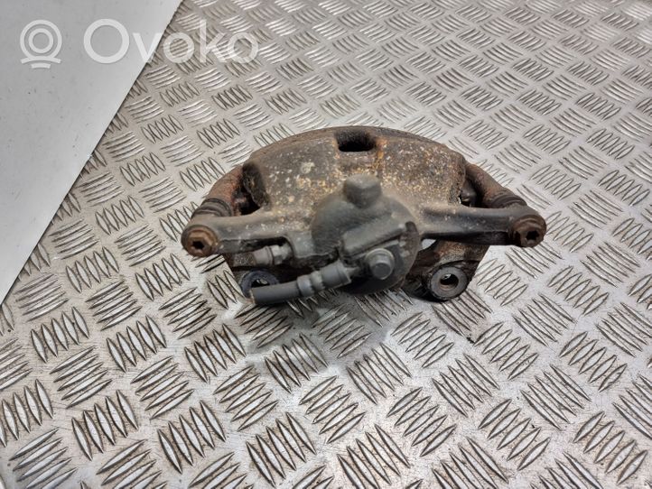 Volkswagen Touran III Front brake caliper 