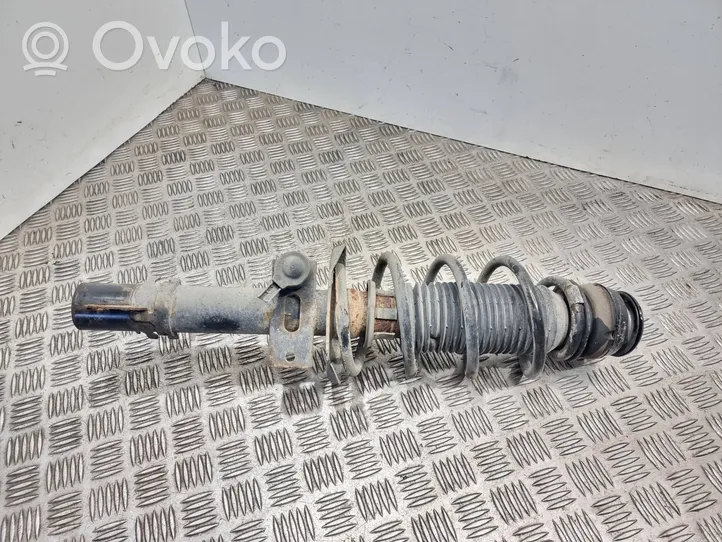 Volkswagen Cross Polo Front shock absorber with coil spring 6r0413031