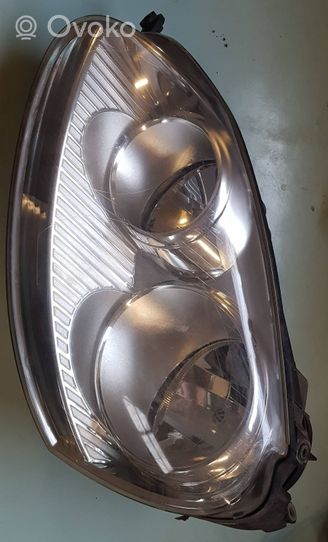 Volkswagen Golf V Lampa przednia 1K6941005R