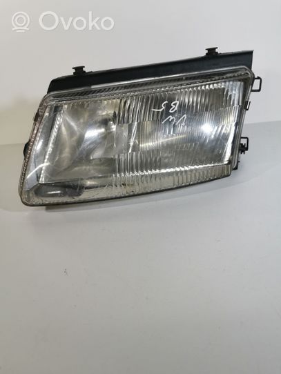 Volkswagen PASSAT B5 Lampa przednia 14869100