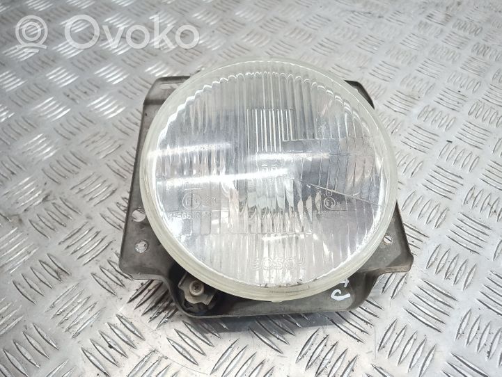 Volkswagen Golf II Lampa przednia 1305603018