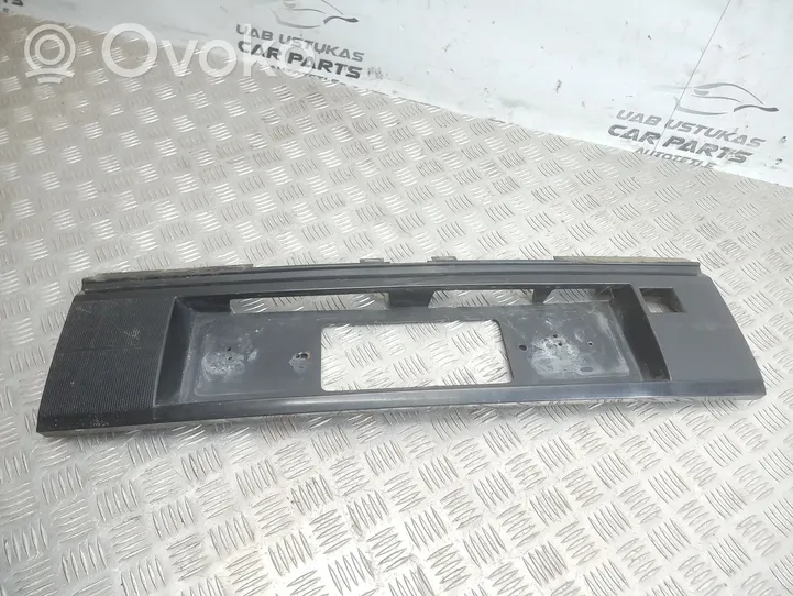 Volkswagen PASSAT B3 Trunk door license plate light bar 357853489