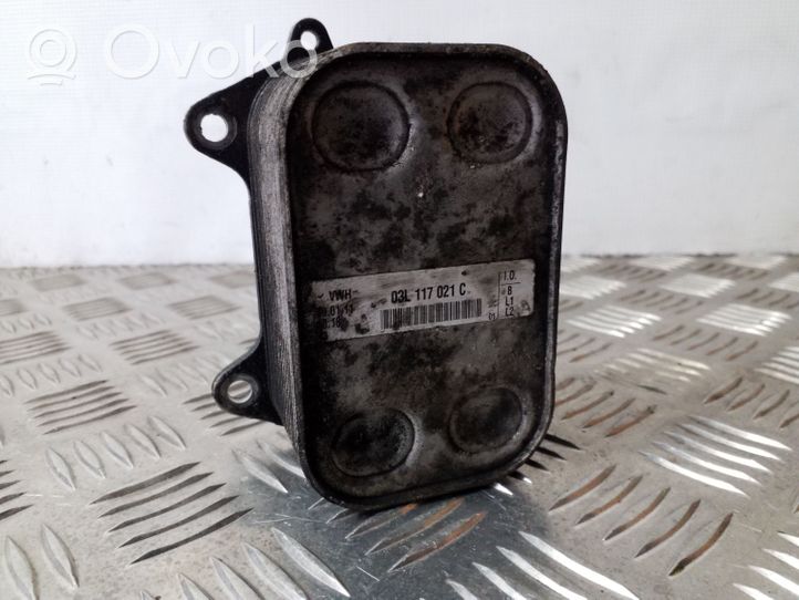 Volkswagen Touran II Supporto di montaggio del filtro dell’olio 03L117021C