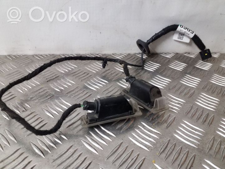 Opel Mokka Lampa oświetlenia tylnej tablicy rejestracyjnej 1350217