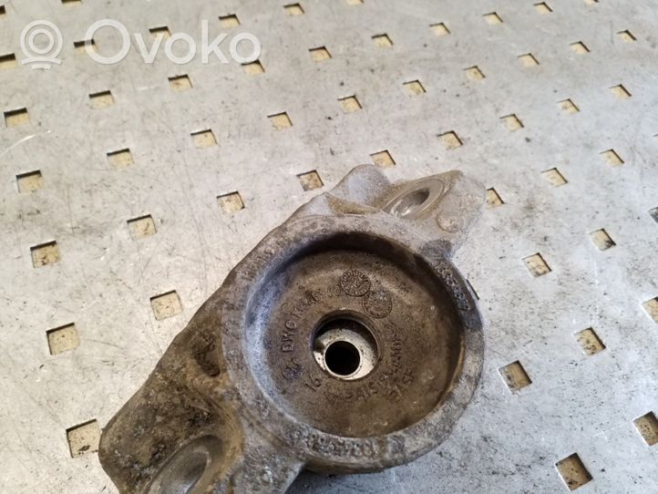 Opel Astra J Front shock absorber mounting bracket 