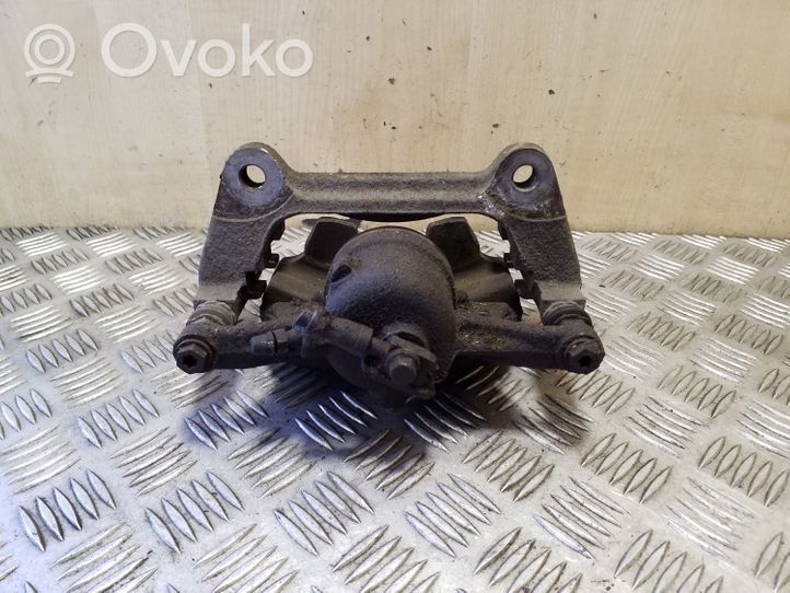 Volkswagen PASSAT B8 Caliper de freno delantero 