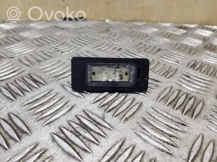 BMW X1 E84 Lampa oświetlenia tylnej tablicy rejestracyjnej 63267193293