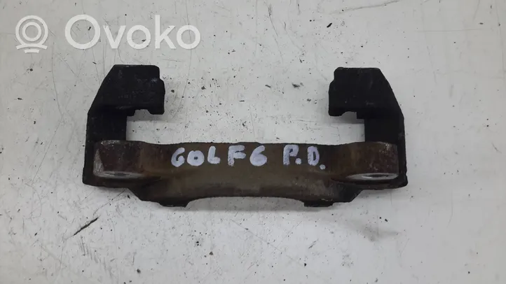 Volkswagen Golf VI Plaquette / support d'étrier avant 