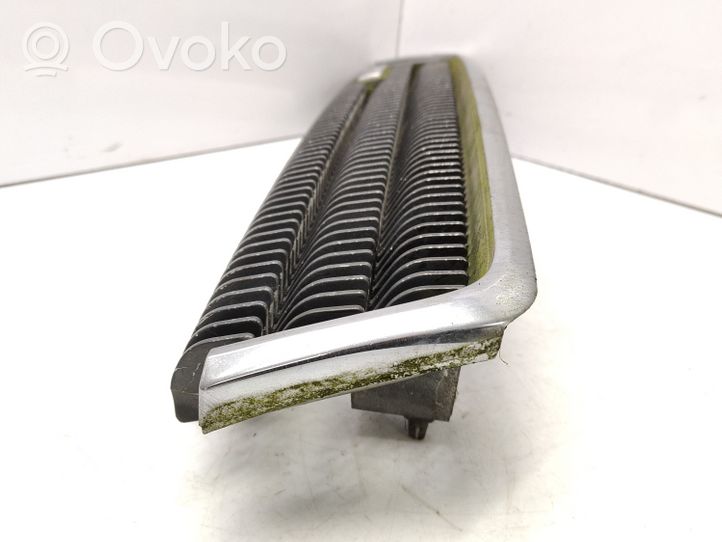 Mazda 929 Front bumper upper radiator grill HF7550710