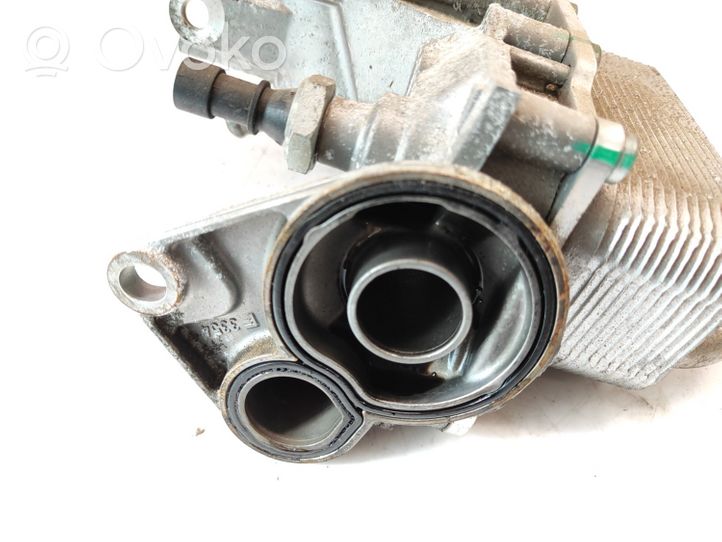 Opel Astra J Supporto di montaggio del filtro dell’olio 55577343