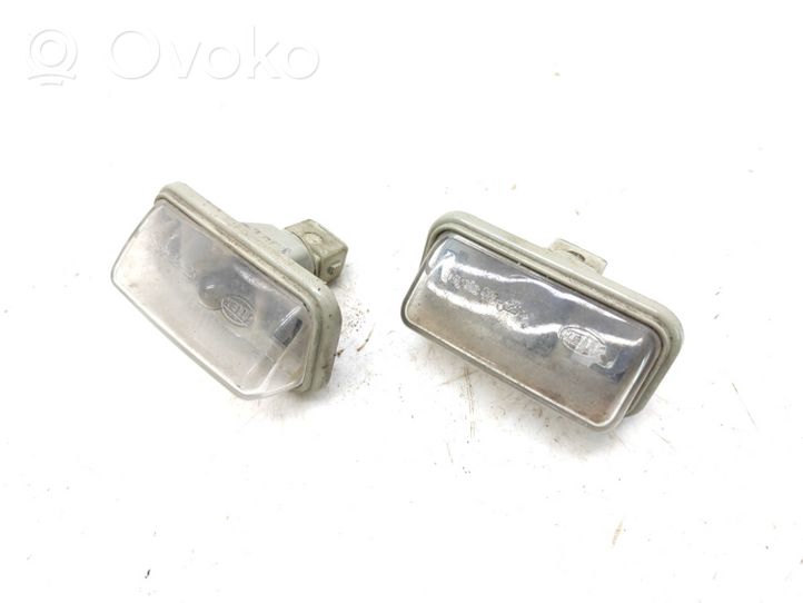 Toyota Corolla E120 E130 Lampa oświetlenia tylnej tablicy rejestracyjnej 