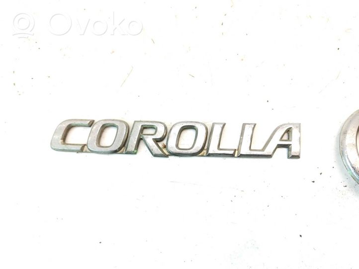 Toyota Corolla E120 E130 Emblemat / Znaczek tylny / Litery modelu 3280T010