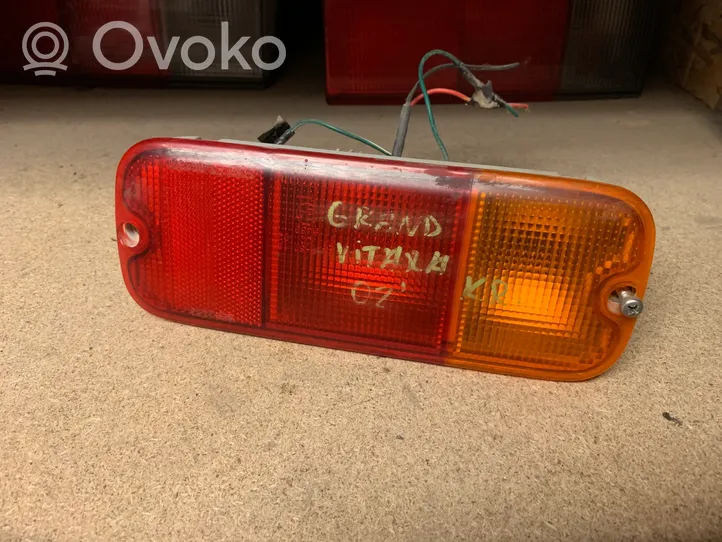 Suzuki Grand Vitara I Miglas lukturis aizmugurē RR2301
