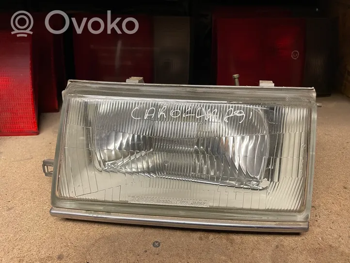 Toyota Corolla E80 Lampa przednia 12230