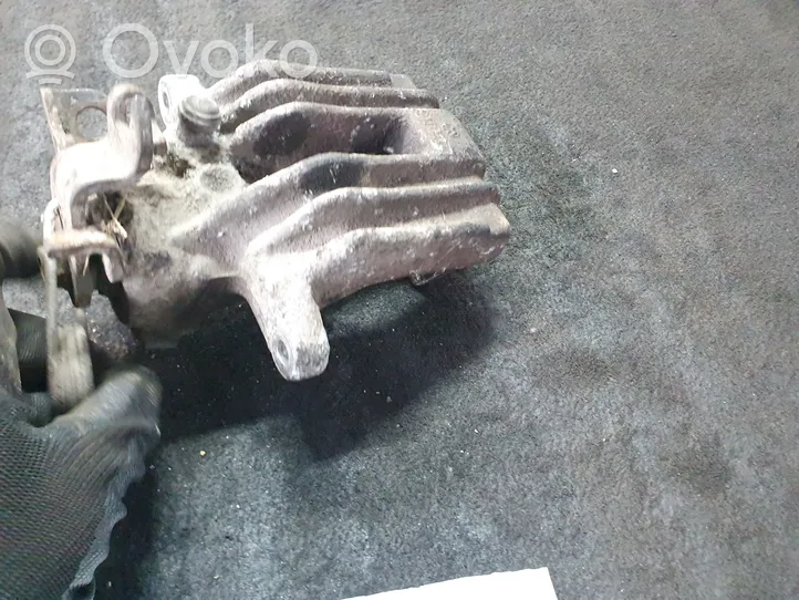 Volkswagen PASSAT B5 Caliper del freno trasero 