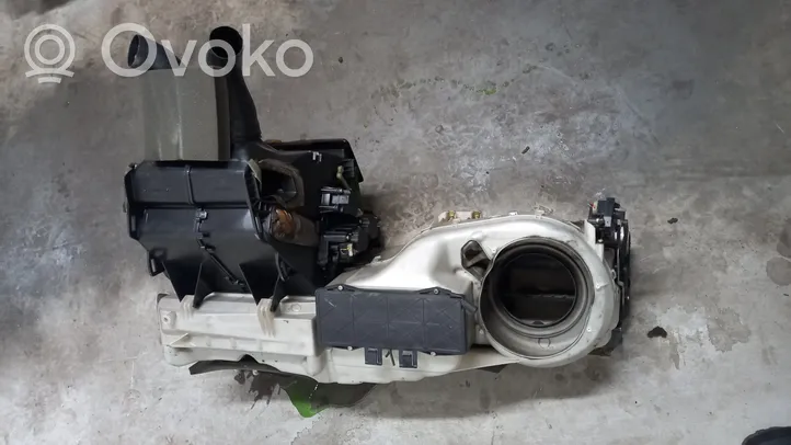 Volvo S60 Montaje de la caja de climatización interior 