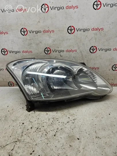 Toyota Corolla E120 E130 Lampa przednia 8111002380