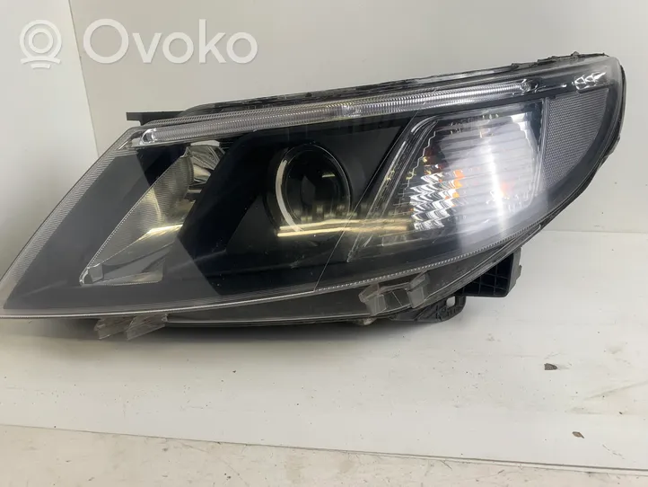 Saab 9-3 Ver2 Lampa przednia 12770145