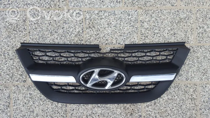 Hyundai Atos Prime Maskownica / Grill / Atrapa górna chłodnicy 8636105700