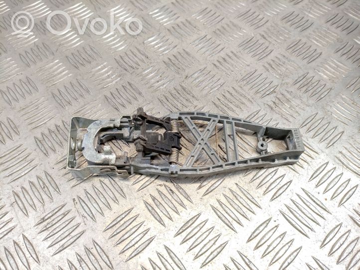 Volkswagen Caddy Klamka/wspornik zewnętrzny drzwi przednich 1T0837885B