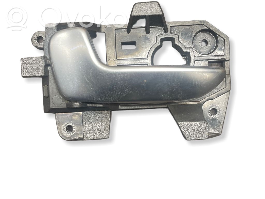 KIA Carens III Front door interior handle 