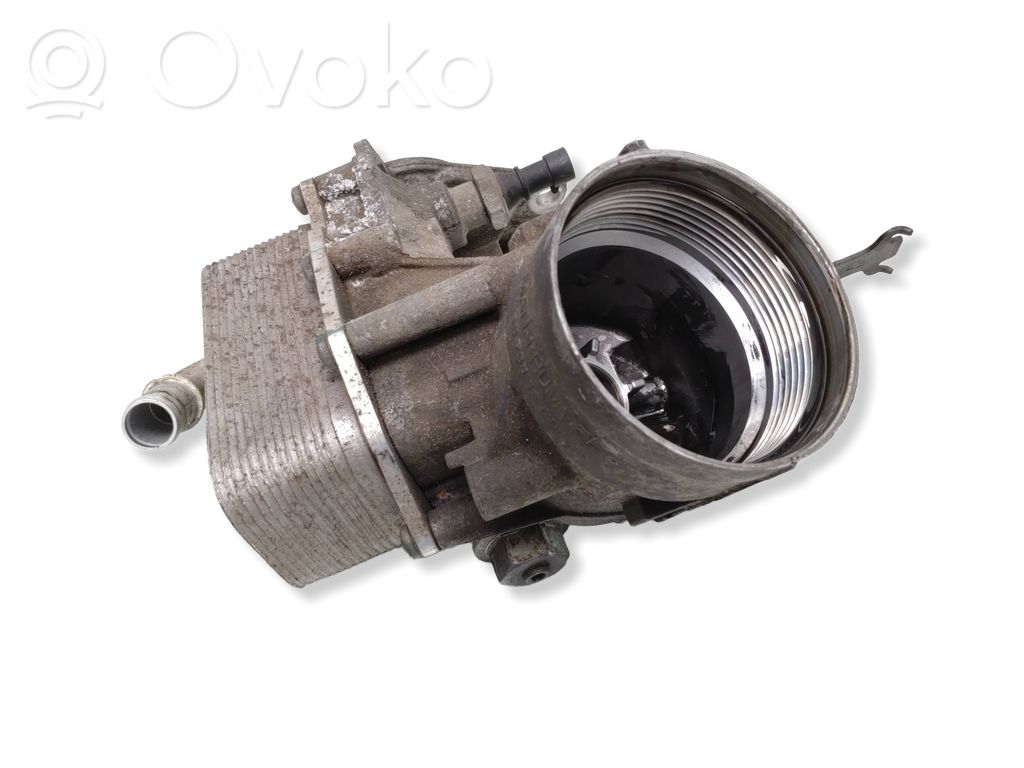 Opel Astra J Oil filter mounting bracket 