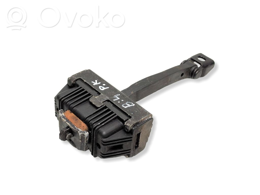 Front door check strap stopper   7176804