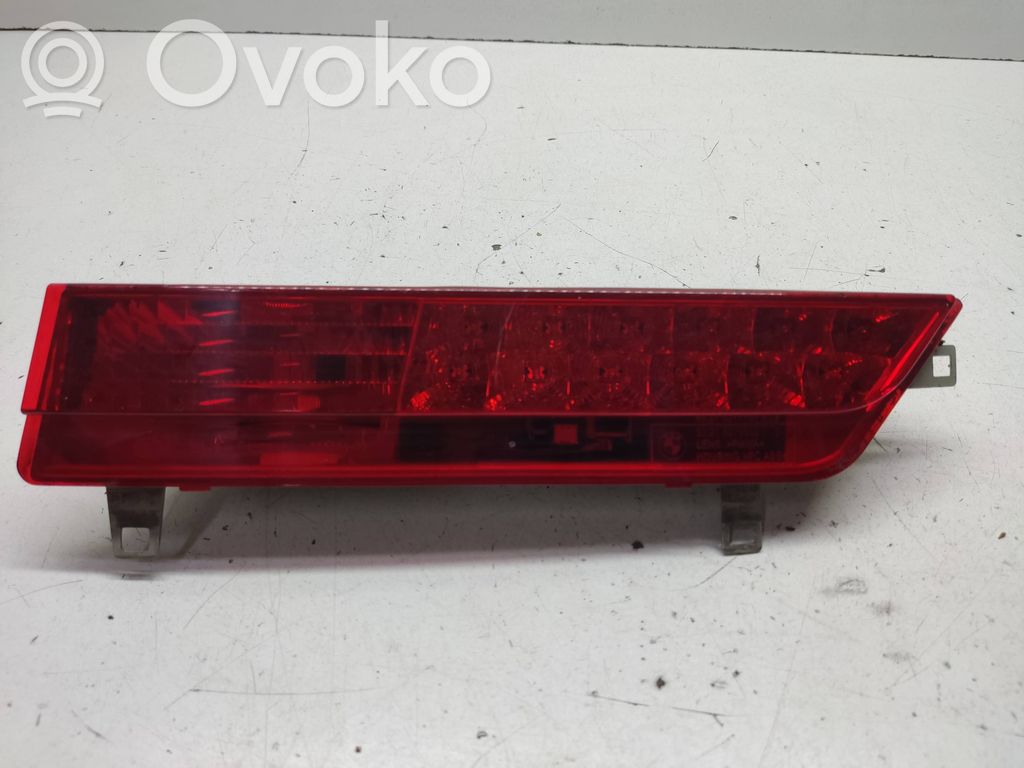 BMW 7 E65 E66 Aizmugurējais lukturis pārsegā 