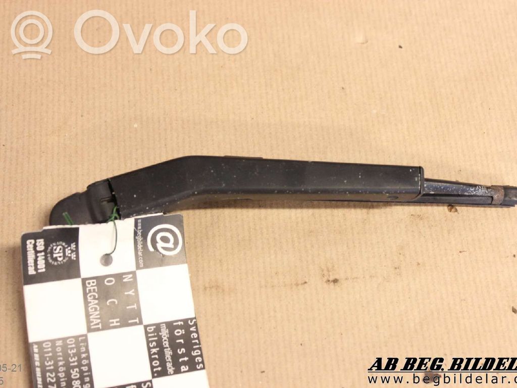 Headlight wiper arm