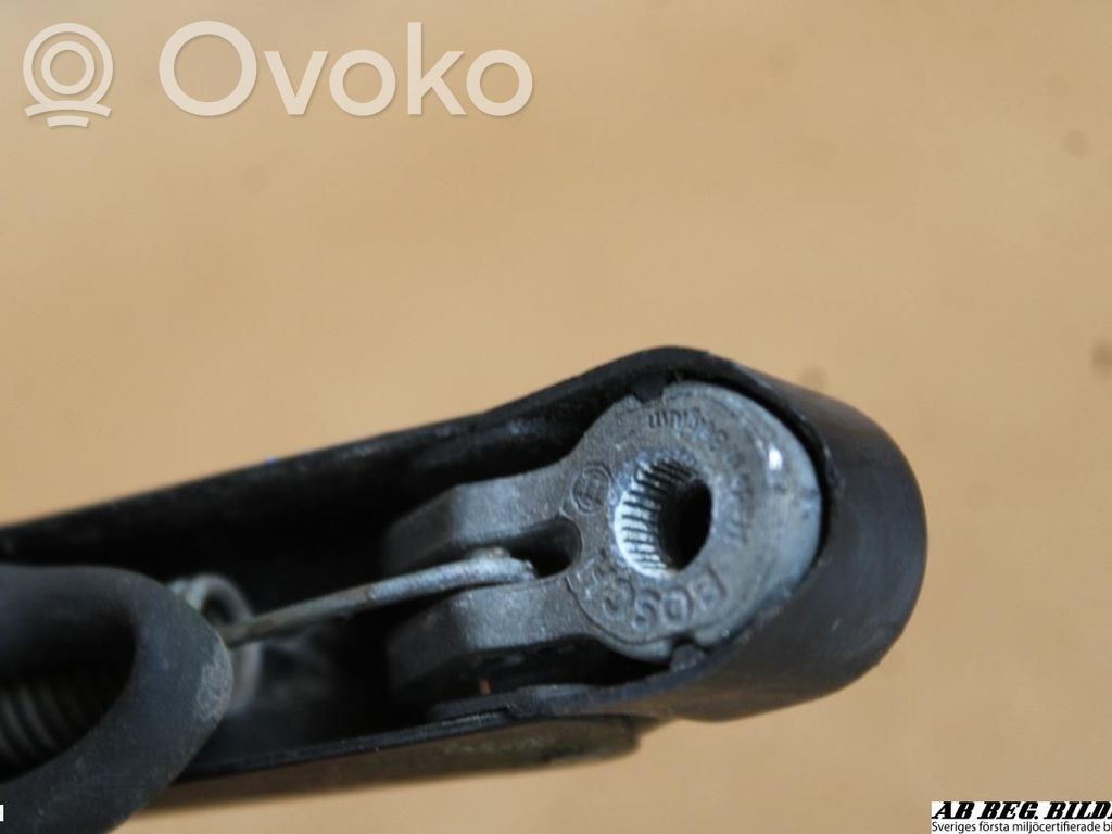 Headlight wiper arm