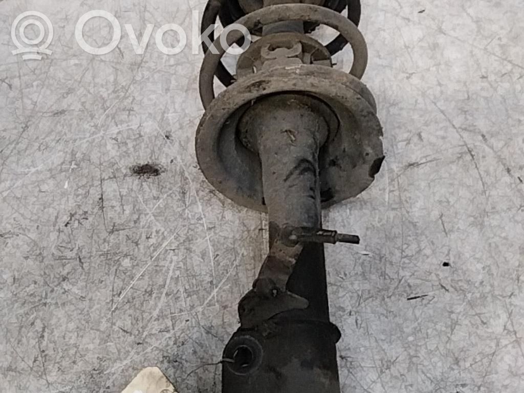 Amortyzator osi przedniej ze sprężyną   8200061950