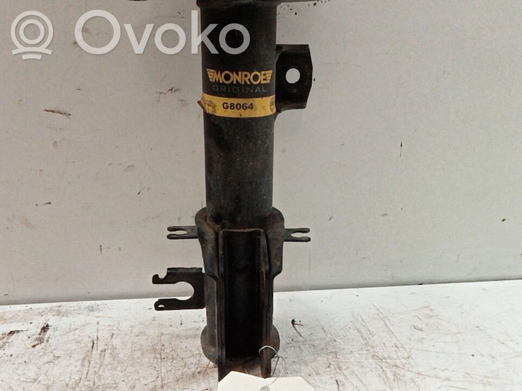 Opel Corsa D Amortiguador delantero con muelle espiral 