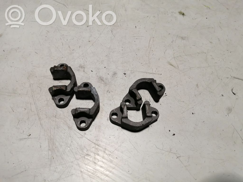 Polttoaineen suihkutuksen pidike