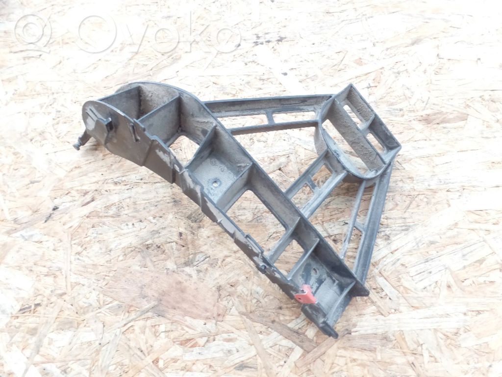 Rear bumper mounting bracket   13100355