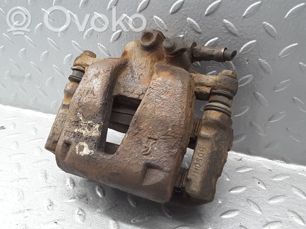 Opel Corsa D Front brake caliper 