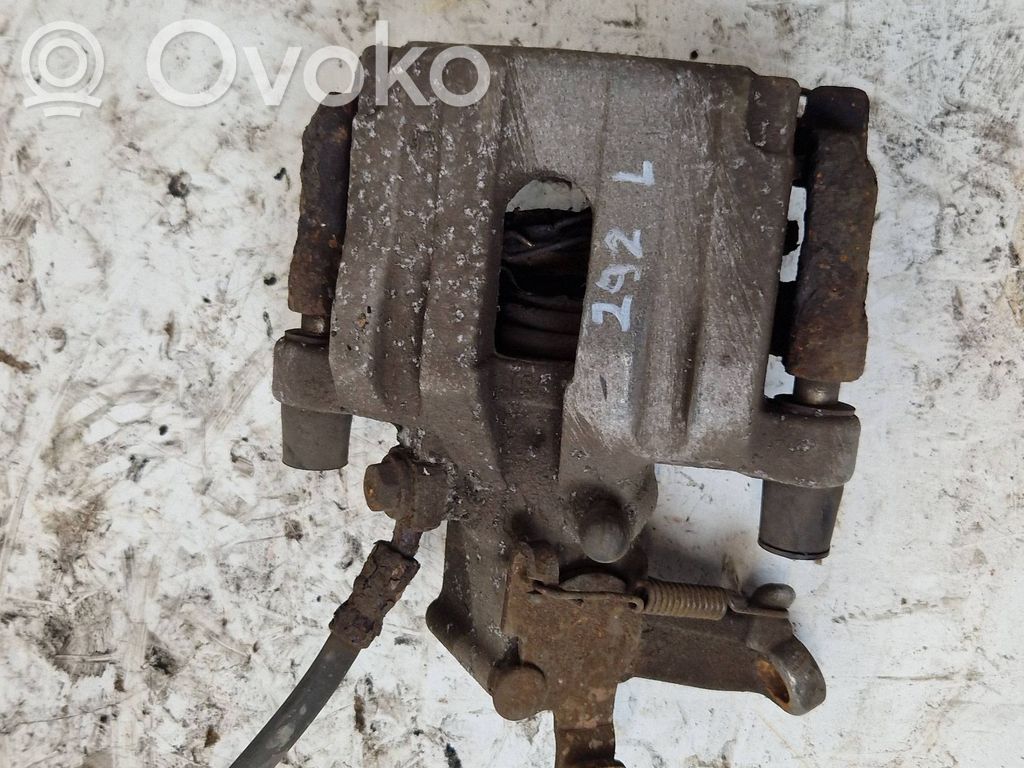 Saab 9-3 Ver2 Tylny zacisk hamulcowy 