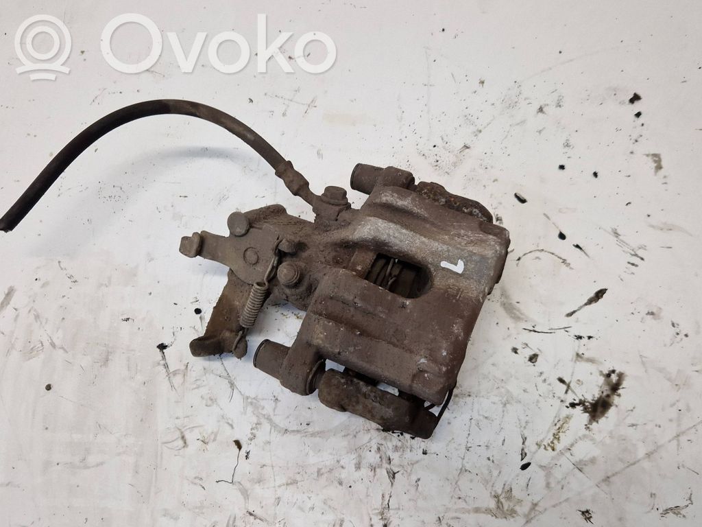 Saab 9-3 Ver2 Tylny zacisk hamulcowy 